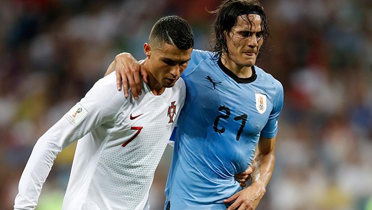 Cristiano Ronaldo akan bertemu dengan mantan pemain Manchester United, Edinson Cavani di laga Piala Dunia 2022 antara Portugal vs Uruguay. - INDOSPORT