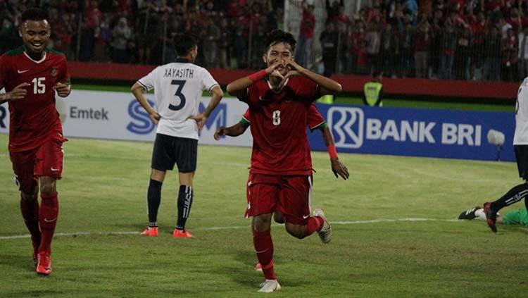 Selebrasi Witan usai mencetak gol ke gawang Laos. - INDOSPORT