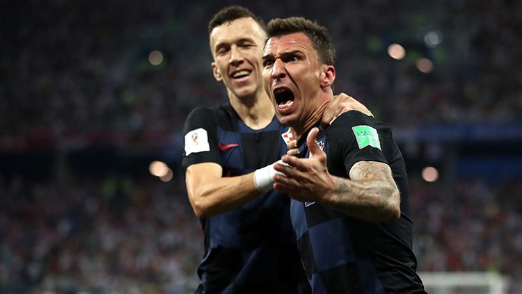 Mandzukic merayakan gol yang dicetaknya ke gawang Denmark. Copyright: INDOSPORT