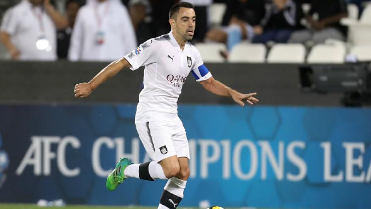 Xavi Hernandez saat berseragam klub Liga Qatar, Al Sadd. - INDOSPORT