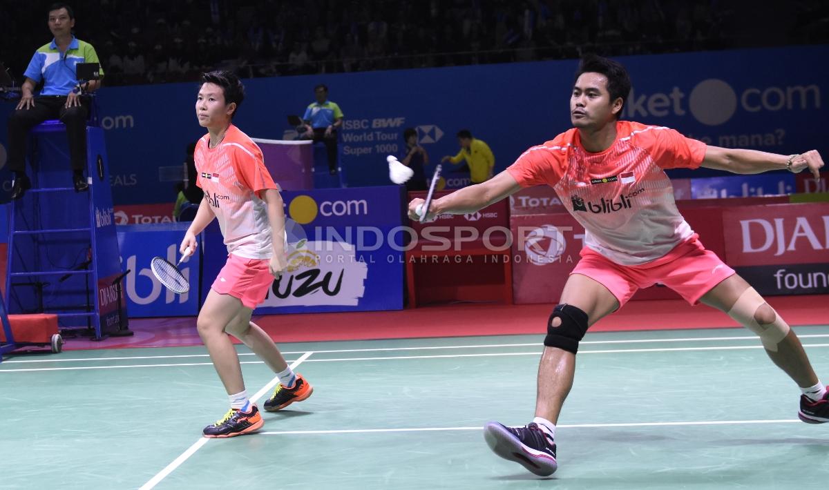 Tontowi Ahmad/Liliyana Natsir ketika bertanding melawan ganda campuran asal Jepang, Yugo Kobayashi/Misaki Matsutomo, di Indonesia Open 2018, Kamis (05/07/18). Herry Ibrahim/INDOSPORT