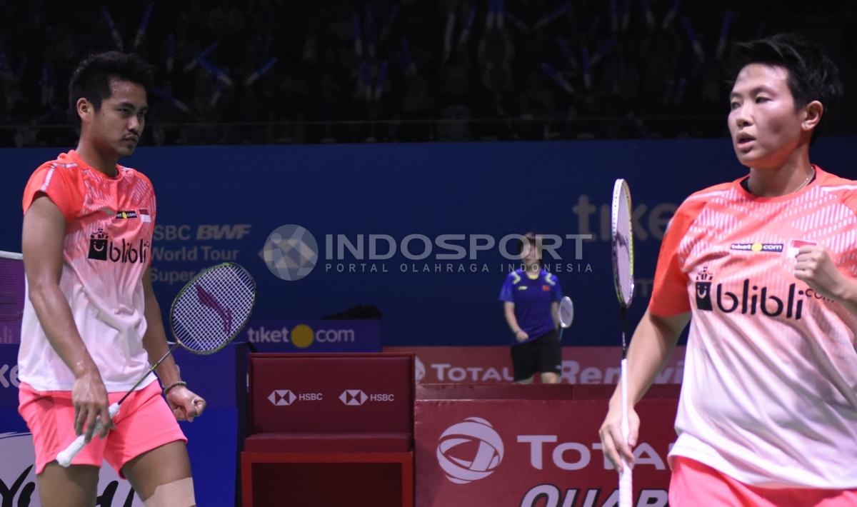 Tontowi Ahmad/Liliyana Natsir ketika bertanding melawan ganda campuran asal Jepang, Yugo Kobayashi/Misaki Matsutomo, di Indonesia Open 2018, Kamis (05/07/18). Herry Ibrahim/INDOSPORT