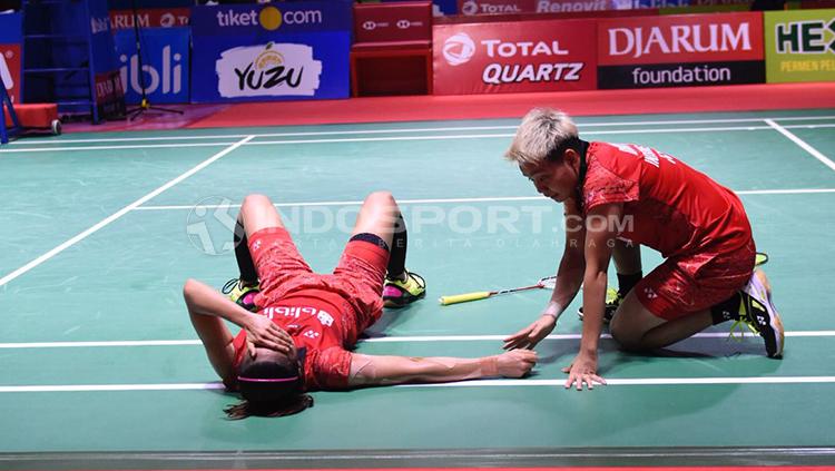 Indosport - Greysia Polii/Apriyani Rahayu saat kalah dari pasangan Jepang di Indonesian Open 2018.
