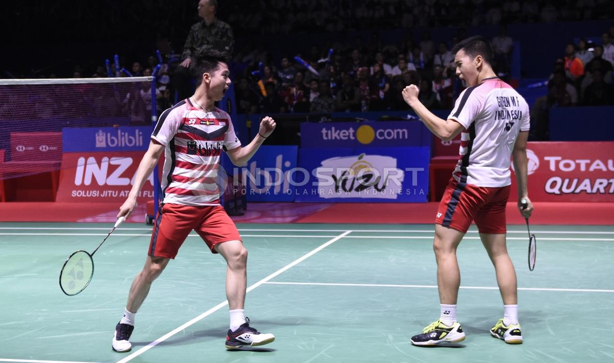Aksi selebrasi Marcus Fernaldi Gideon/Kevin Sanjaya Sukamuljo menjadi juara Indonesia Open 2018.