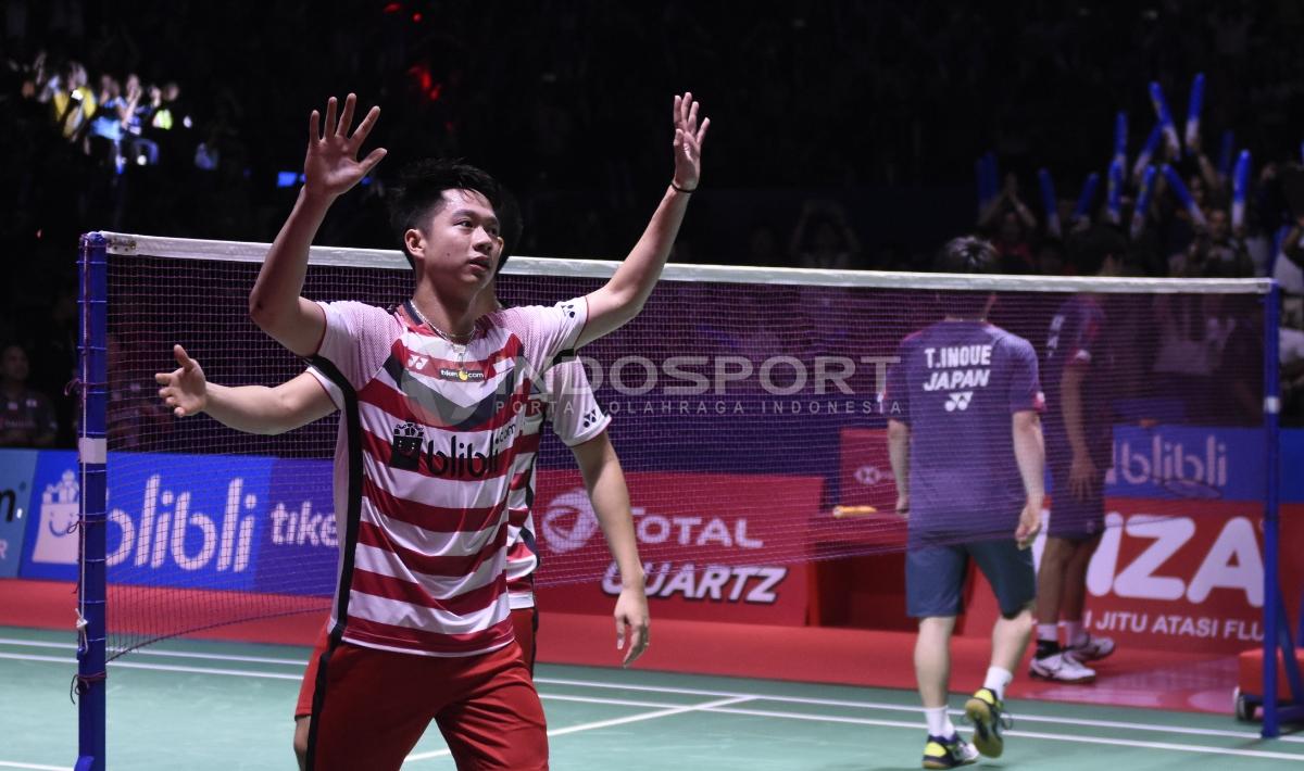 Aksi selebrasi Marcus Fernaldi Gideon/Kevin Sanjaya Sukamuljo menjadi juara Indonesia Open 2018.
