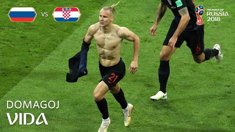 Selebrasi Domagoj Vida usai mencetak gol ke gawang Rusia, Minggu (08/07/18) - INDOSPORT
