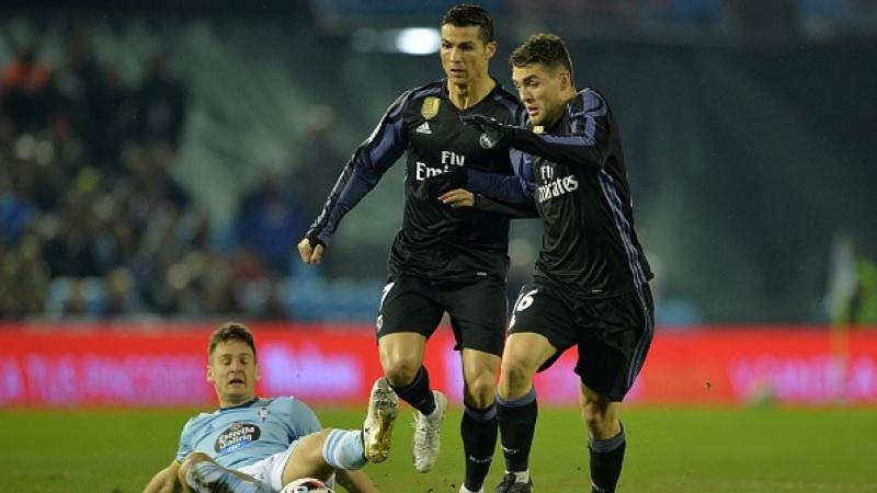 Cristiano Ronaldo (tengah) dan Mateo Kovacic (kanan).