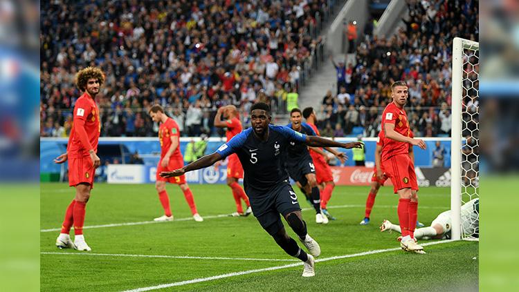 Selebrasi kegembiraan Samuel Umtiti usai mencetak gol ke gawang Belgia.