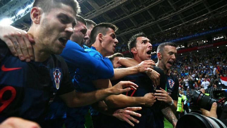 Selebrasi pemain Kroasia saat cetak gol ke gawang Inggris.