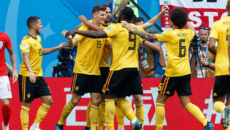 Pemain Belgia merayakan gol yang dicipatakan oleh Thomas Meunier.