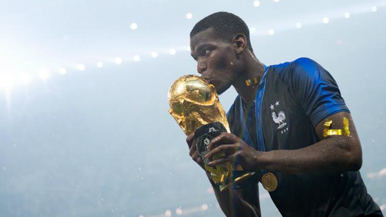 Paul Pogba merayakan kemenangan Prancis di Piala Dunia 2018.