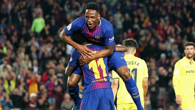 Yerry Mina berseragam Barcelona. - INDOSPORT