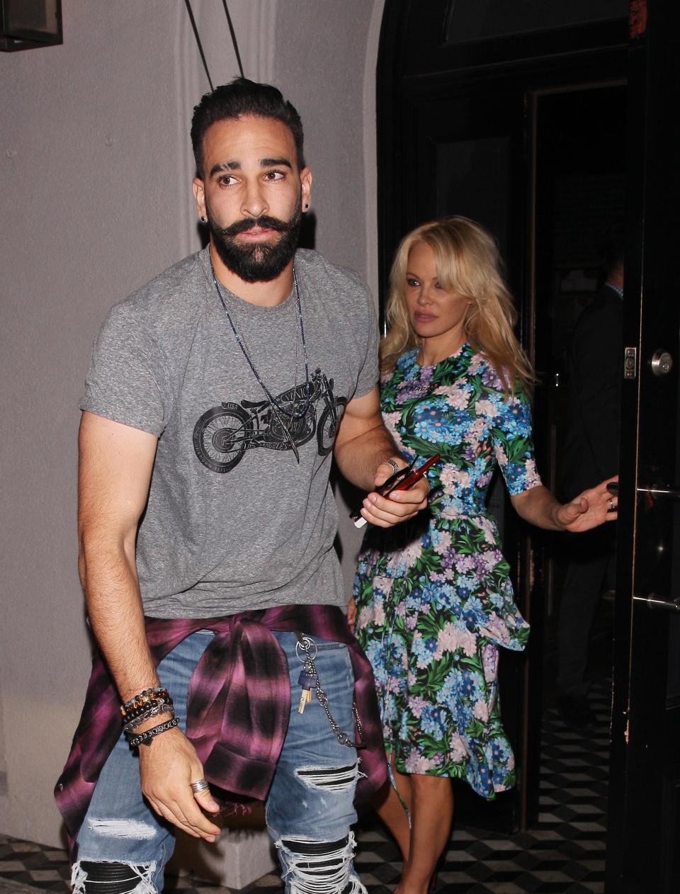 Pamela Anderson bersama Adil Rami Copyright: The Sun