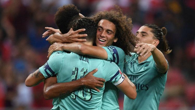 Para pemain Arsenal merayakan gol ketika bersua Paris Saint-Germain di ICC 2018.