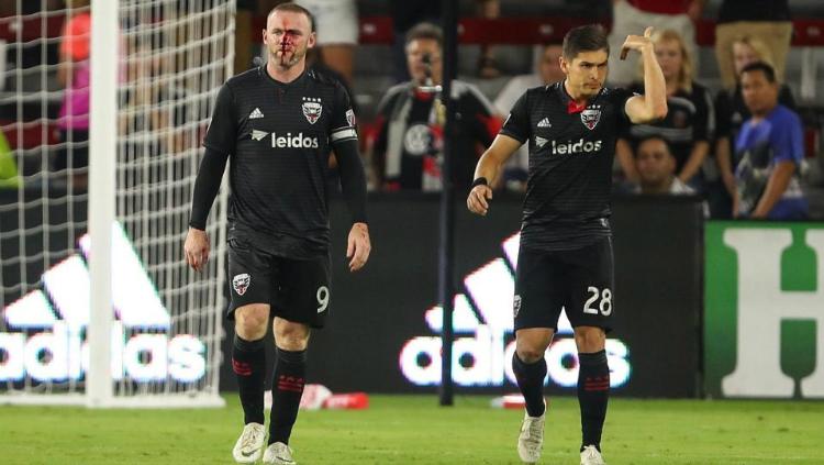 Wayne Rooney tampak berdarah di bagian hidung saat laga di mana dirinya mencetak gol pertamanya untuk DC United.