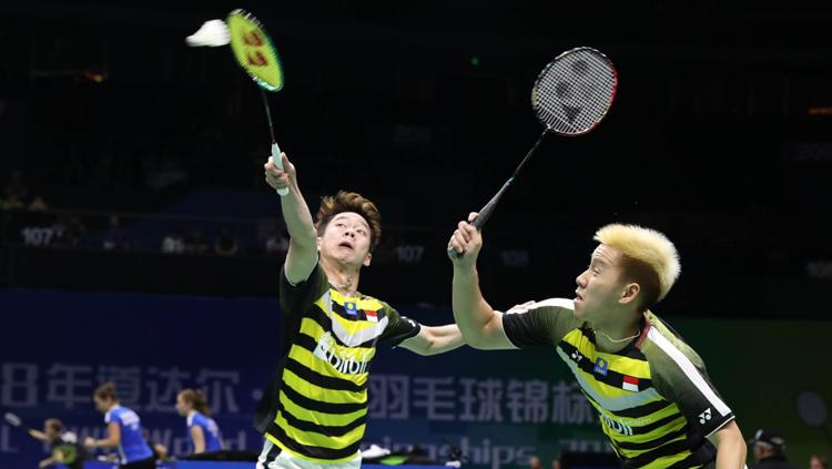 Kevin/Marcus saat tampil di ajang World Championships 2018. Copyright: Badminton Indonesia