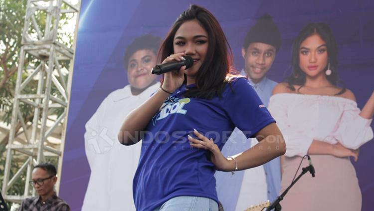 Marion Rambu Jola Pedi membawakan lagu di event Run with Indonesia Idol 20181.