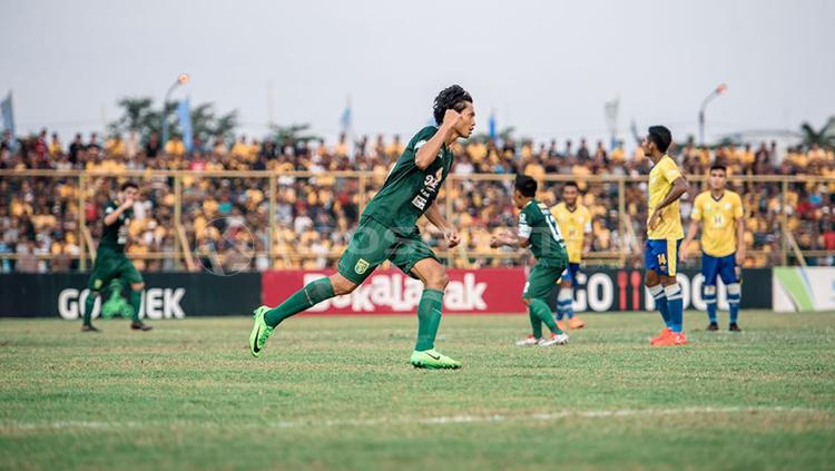 Selebrasi yang dilakukan Rishadi Fauzi. Copyright: Fitra herdian/INDOSPORT