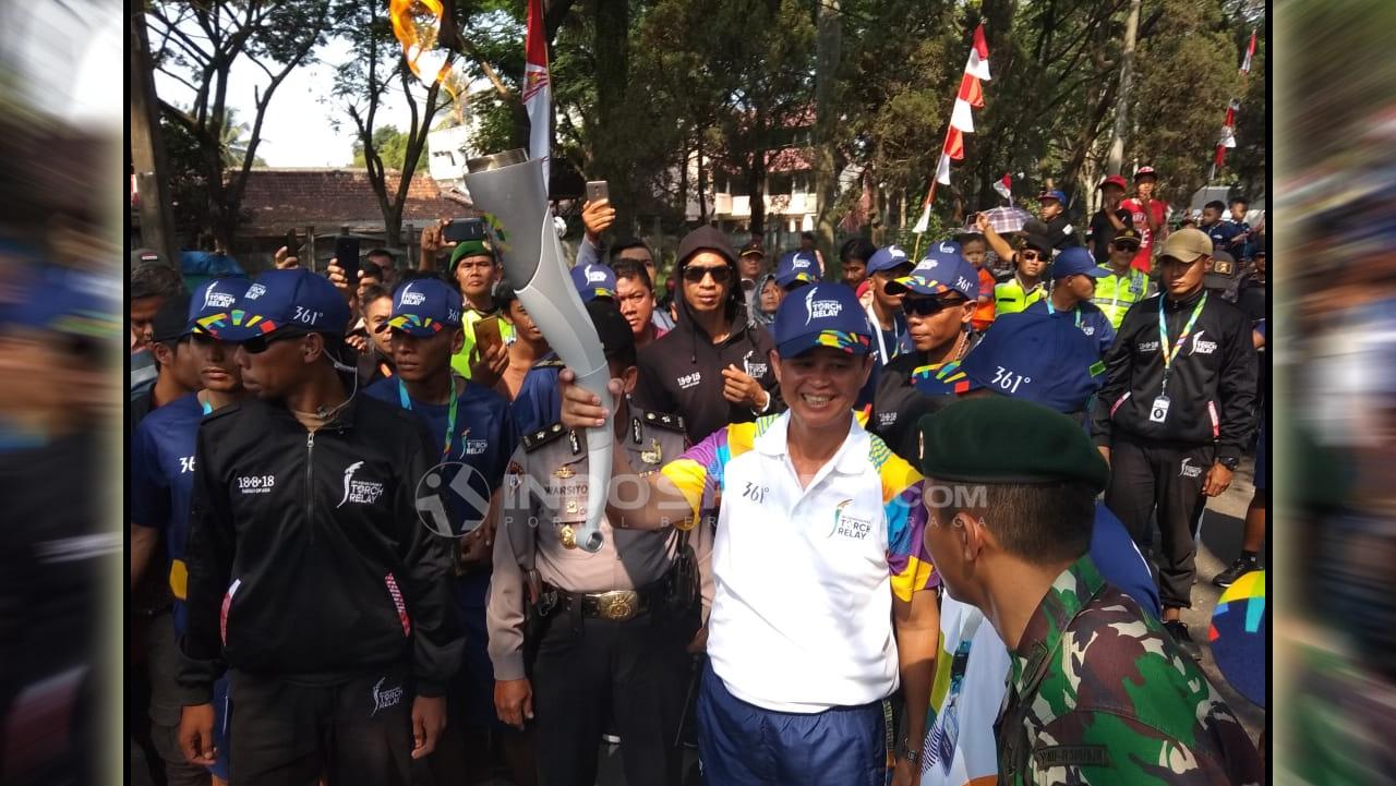 Rombongan Api obor Asian Games tiba di Kabupaten Cianjur setelah sebelumnya di arak di kabupaten Purwakarta, Bandung, dan Garut.