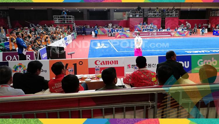 Jokowi hadiri pertandingan cabor wushu di Asian Games 2018. Copyright: INDOSPORT/Abdul Aziz