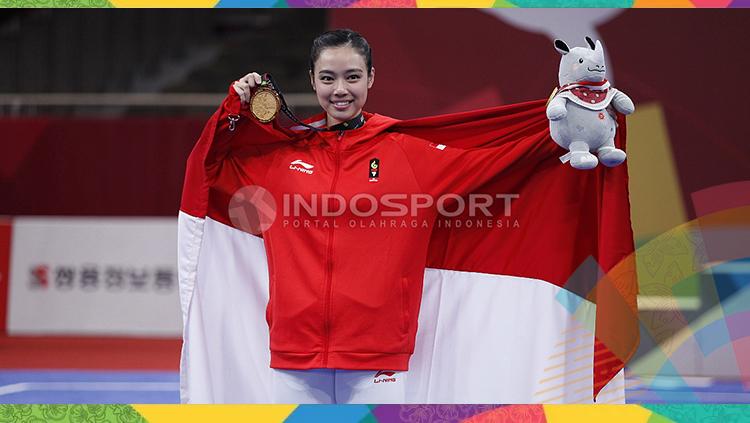 Atlet wushu Indonesia, Lindswell Kwok sabet medali emas Asian Games 2018.