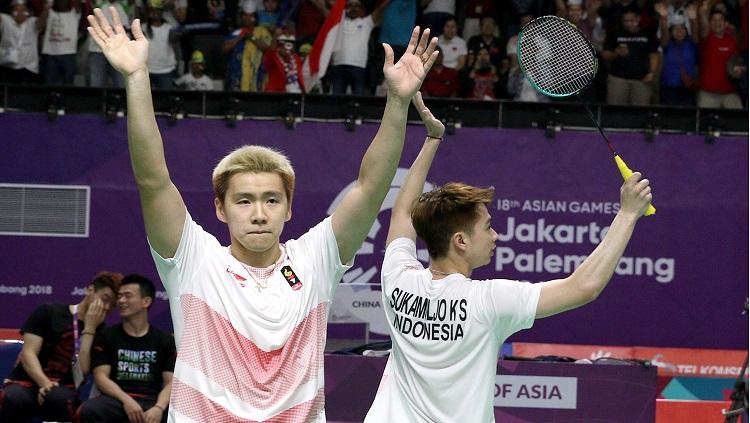 Marcus Gideon/Kevin Sanjaya menjadi satu-satunya yang berhasil menyumbang angka d laga final bulutangkis beregu putra Asian Games 2018 antara Indonesia vs China. Copyright: Humas PBSI