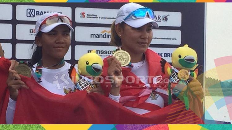 Dayung ganda putri dapat medali perunggu. Copyright: INDOSPORT/Lanjar Wiratri