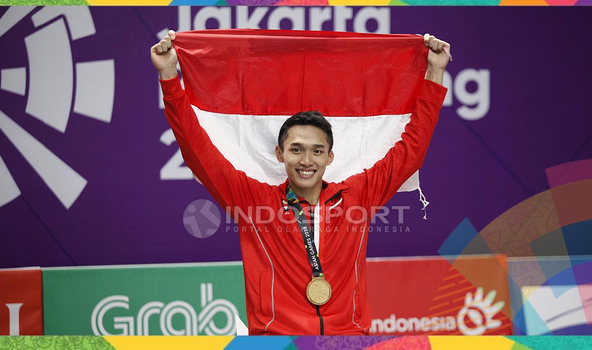 Tunggal putra Indonesia, Jonatan Christie saat menyabet medali emas nomor individu cabor bulutangkis Asian Games 2018.