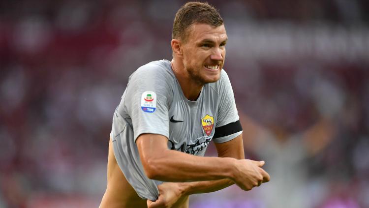 Striker AS Roma, Edin Dzeko saat merayakan golnya ke gawang Torino di Serie A Italia. Copyright: Getty Images