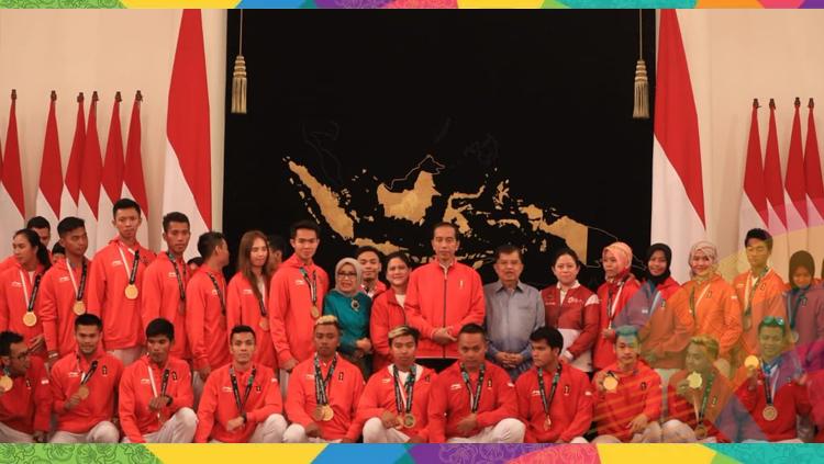 Pemberian bonus atlet berprestasi peraih medali Asian Games 2018 di Istana Negara Jakarta. - INDOSPORT