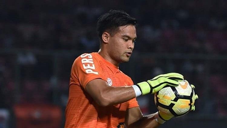 Andritany melakukan pemanasan jelang laga Persija vs Selangor FA Copyright: Twitter @Persija_Jkt