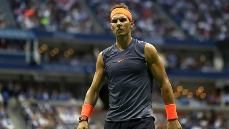 Rafael Nadal pernah berkutat dengan cedera serius sebelum akhirnya sukses mengunci gelar di AS Terbuka 2019. - INDOSPORT