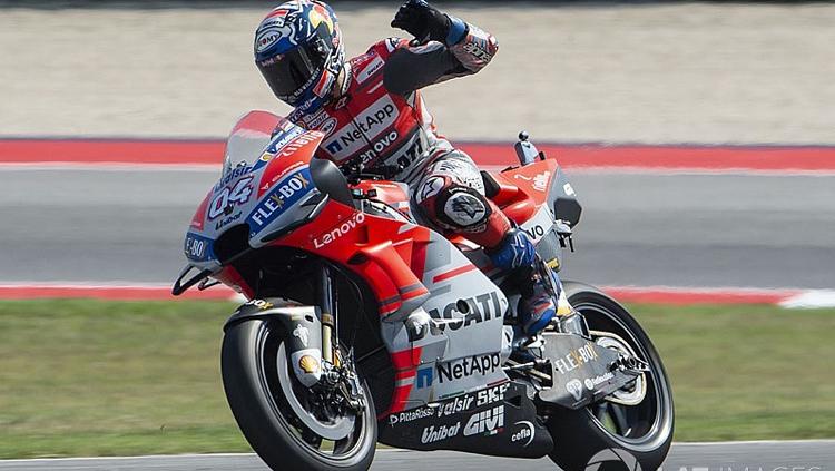 Andrea Dovizioso setelah memastikan juara di MotoGP San Marino 2018. - INDOSPORT