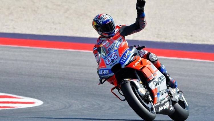 Andrea Dovizioso setelah memastikan juara di MotoGP San Marino 2018. - INDOSPORT