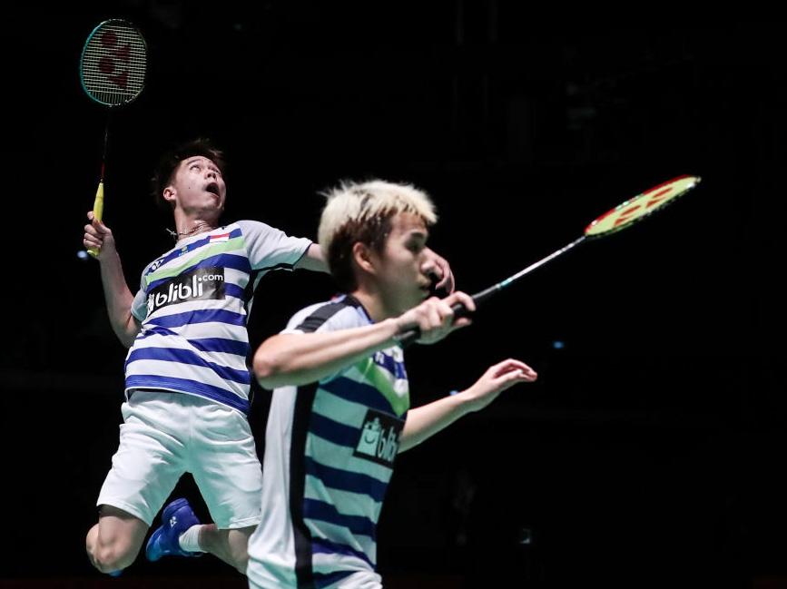 Kevin Sanjaya dan Marcus Gideon menjuarai dalam kejuaraan Japan Open 2018 di Tokyo, Minggu (16/09/18). Copyright: Indosport.com