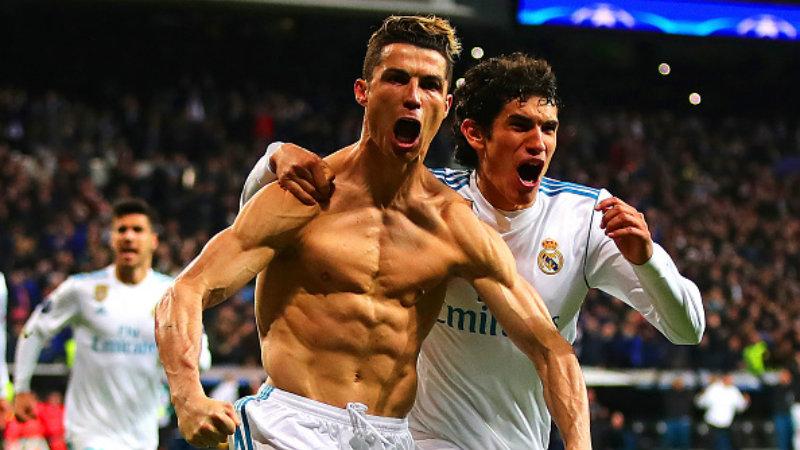Selebrasi Cristiano Ronaldo yang memamerkan otot-otot pada tubuhnya saat masih berada di Real Madrid. Copyright: Getty Images
