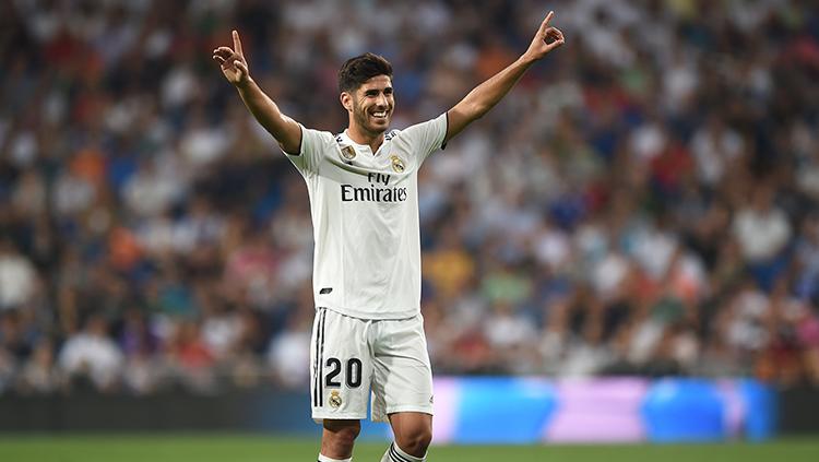 Marco Asensio berselebrasi usai mencetak gol ke gawang