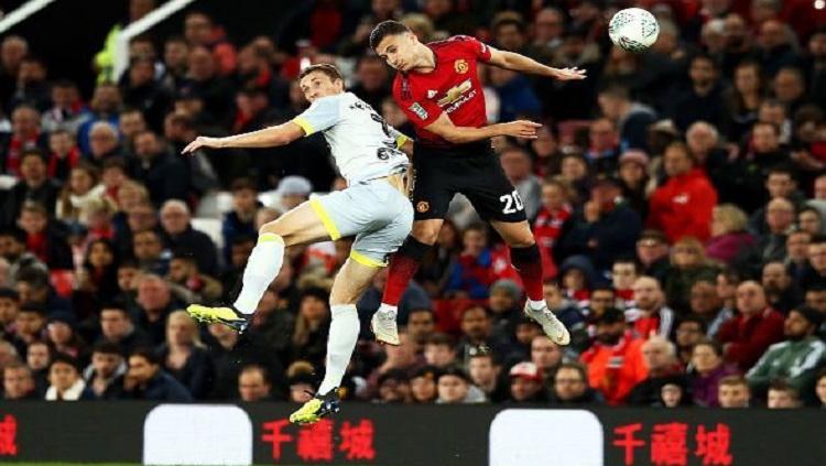 Dalot saat berhadapan dengan pemain Derby County Copyright: Sportskeeda