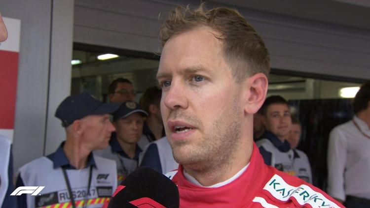 Sebastian Vettel hanya mampu menempati posisi ketiga di Formula 1 Rusia. - INDOSPORT