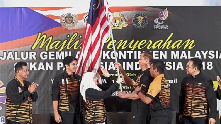 Indonesia harus waspada karena satu atlet lontar martil Malaysia bernama Jackie Wong Siew positif terpapar virus corona.