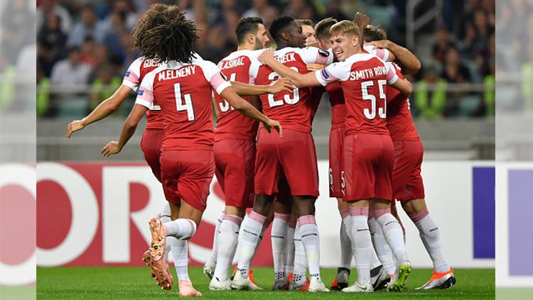 Para pemain Arsenal merayakan gol pertama