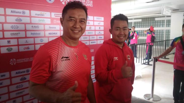 Hary Susanto (depan) tersingkir dari fase grup para badminton Paralimpiade Tokyo 2020