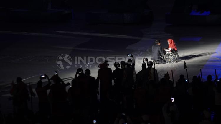 Presiden Joko Widodo menghampiri salah satu atlet disabilitas. Copyright: Roihan Susilo Utomo/Wikimedan