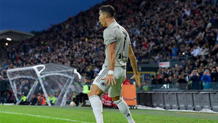 Cristiano Ronaldo saat merayakan gol ke gawang Udinese di Serie A Italia, Sabtu (06/10/18).