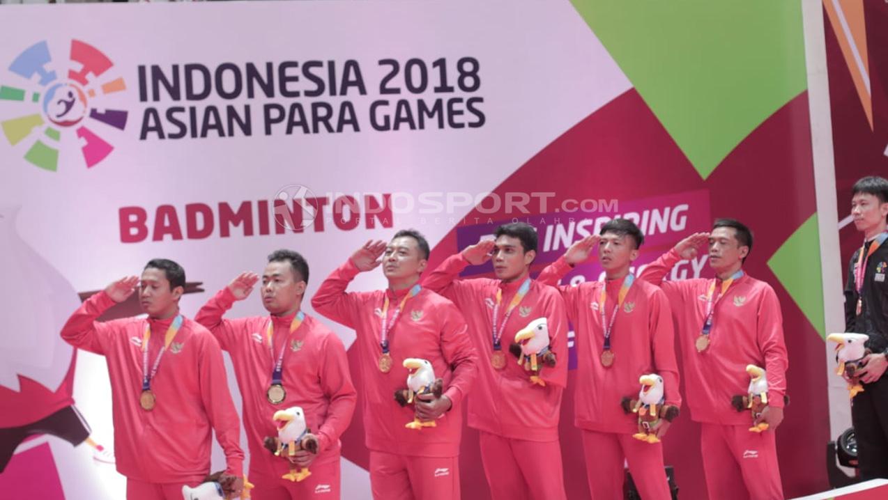 Perolehan Medali Emas, final beregu bulutangkis Indonesia vs Malaysia Asian Para Games 2018. Copyright: Roihan Susilo Utomo/Indosport.com
