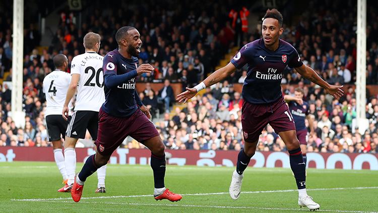 Pierre-Emerick Aubameyang usai menceatak gol ke gawang Fulham. Copyright: INDOSPORT