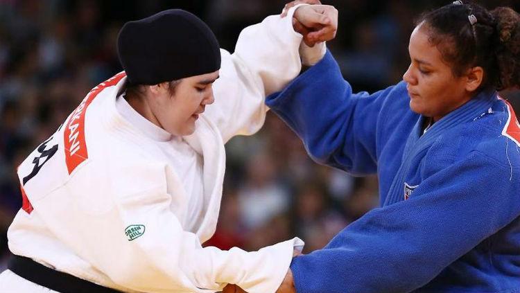 Atlet Judo asal Arab Saudi, Wojdan Shaherkani saat bertanding di Olimpiade London 2012. Copyright: The Independent,