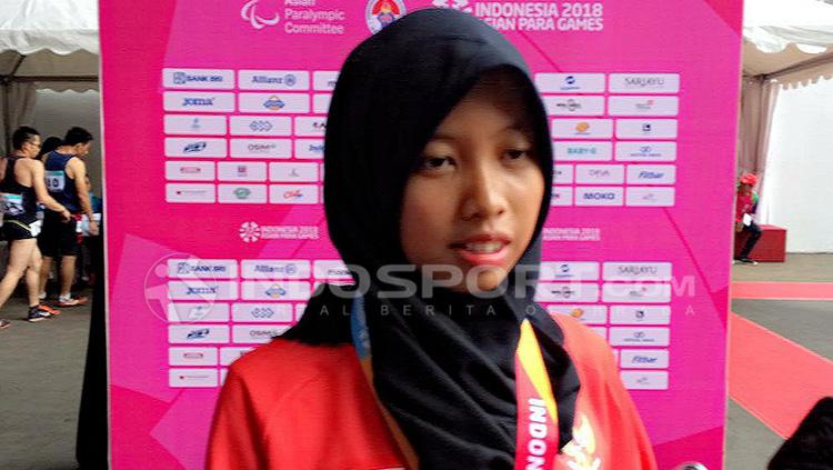 Karisma memperoleh medali emas para atletik lari 100 M - INDOSPORT