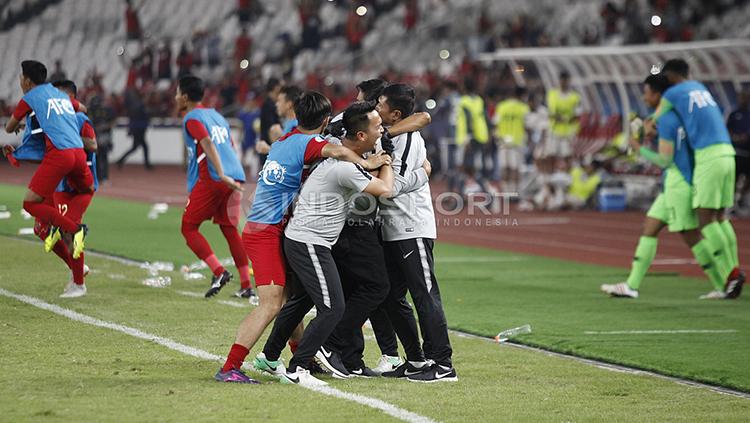 Insdra Sjafri merayakan keberhasilan lolos ke perempatfinal Piala Asia U-19 2018.