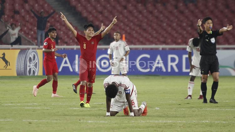 Witan Sulaeman saat berselebrasi selepas Timnas Indonesia U-19 memastikan lolos ke perempatfinal Piala Asia U-19. Copyright: Herry Ibrahim/INDOSPORT